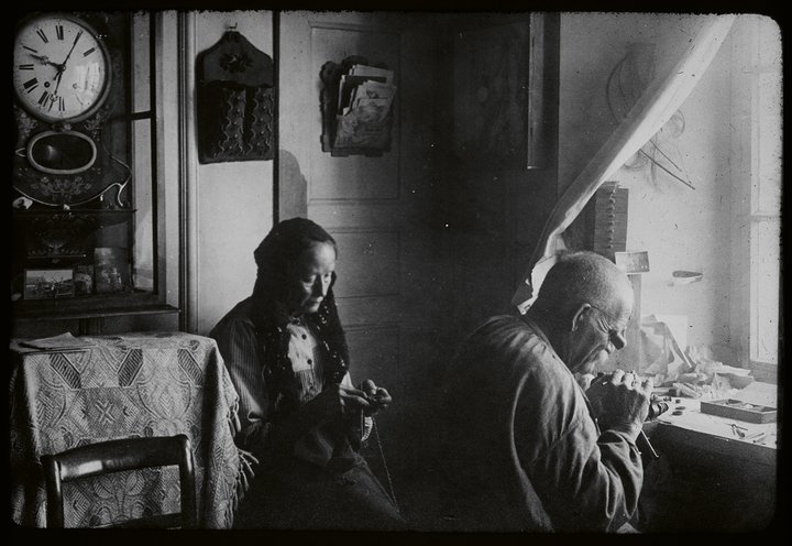 Watchmaker homeworking. Circa 1900. Nouveau Musée Bienne.