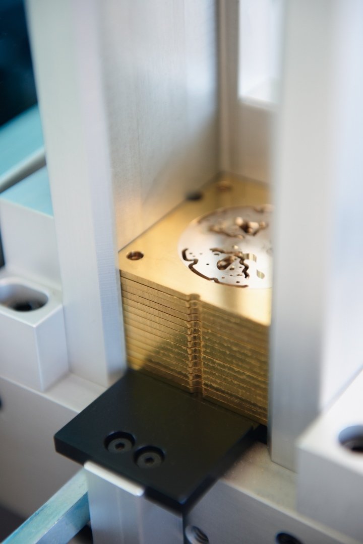 Loading plate blanks at the start of the production line.