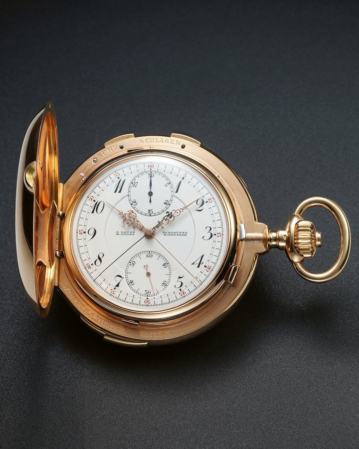 A. Lange & Söhne, Glashütte B/Dresden, no. 60032, ca. 1913. A very rare minute repeating, grande and petite sonnerie clock watch with split-seconds chronograph with 30-minute register.
