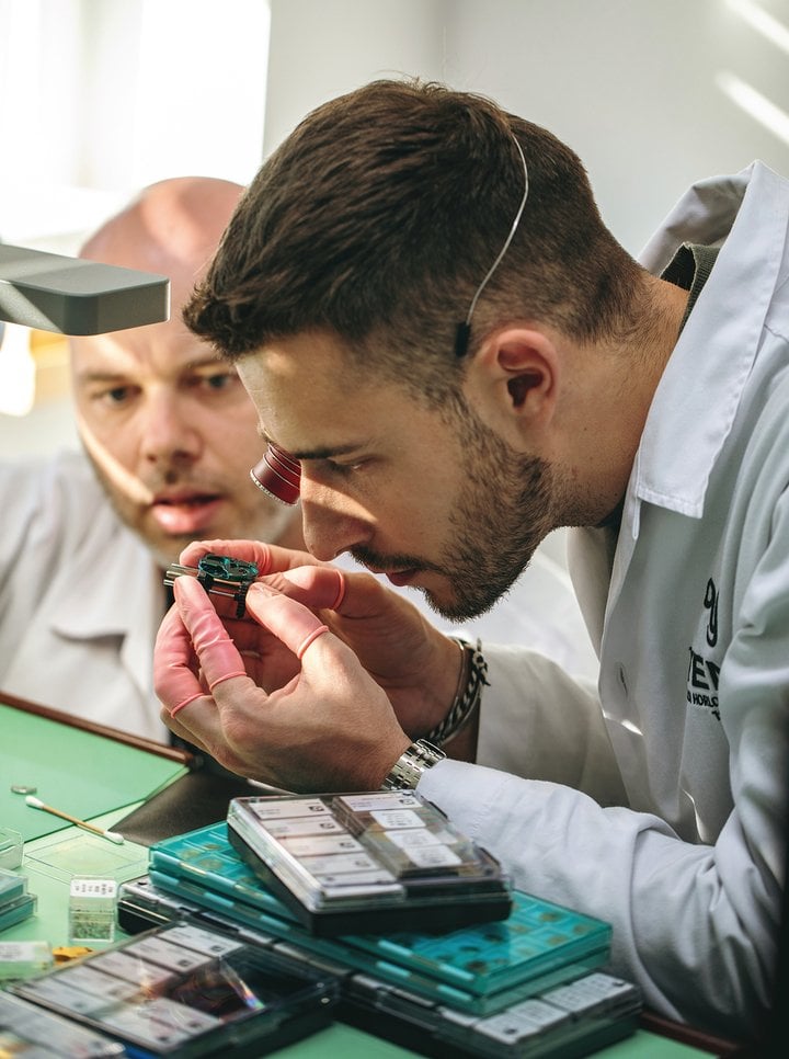 Olivier Mory, designer of Yema's micro-rotor calibre, observes the reactions of quality assurance and technical manager Nicolas Bailly.