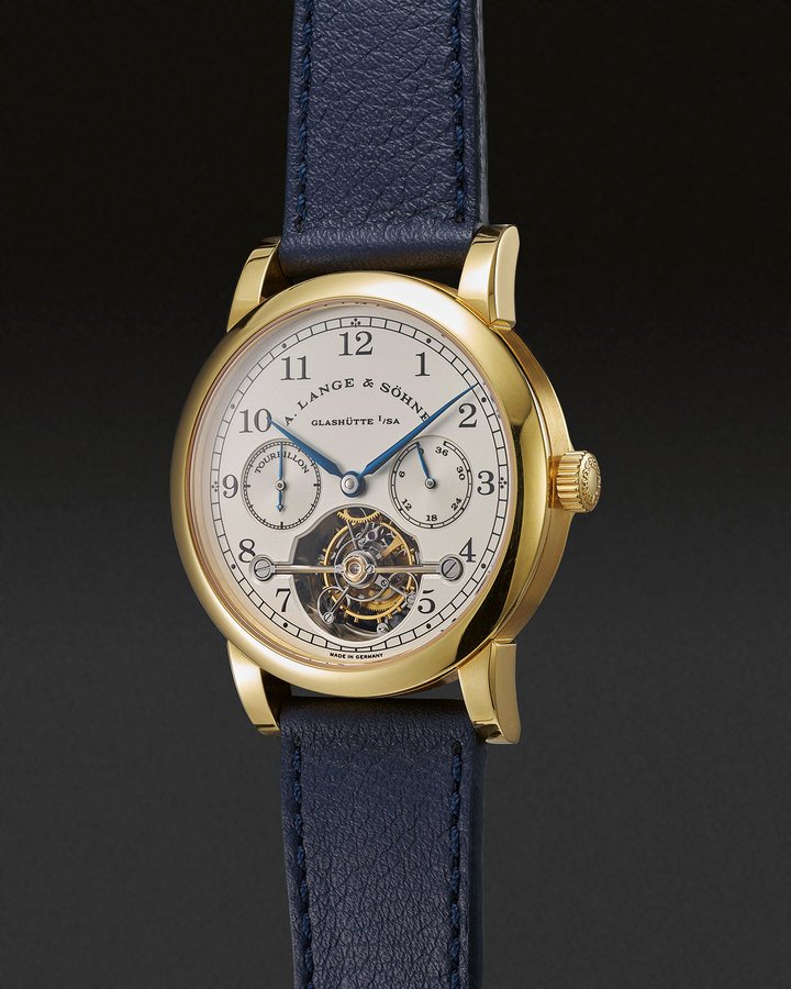 A. Lange & Söhne Glashütte i.Sa., ref. 701.001, Tourbillon “Pour le Mérite” with power reserve indication m. no. 406, c. no. 110323. Limited edition in yellow gold no. 73/150. 1998. Signalling the brand's revival, this was the first wristwatch to incorporate a fusee-and-chain transmission.