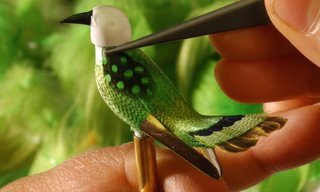 Reuge presents the Green Canary Enchanting Bird