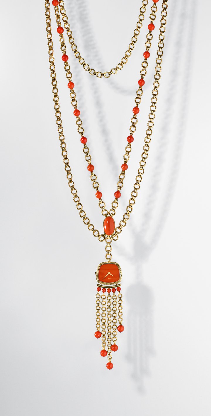 Piaget Swinging Sautoir watch, yellow gold, coral beads and dial. Manufacture 9P ultra-thin hand-wound movement. 1970. Piaget Private Collection.