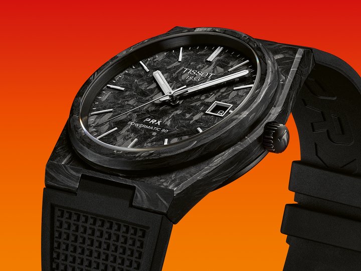 The carbon model stands out with its full black aesthetic that includes a black date window disc and rubber strap – a unique feature among the new releases.