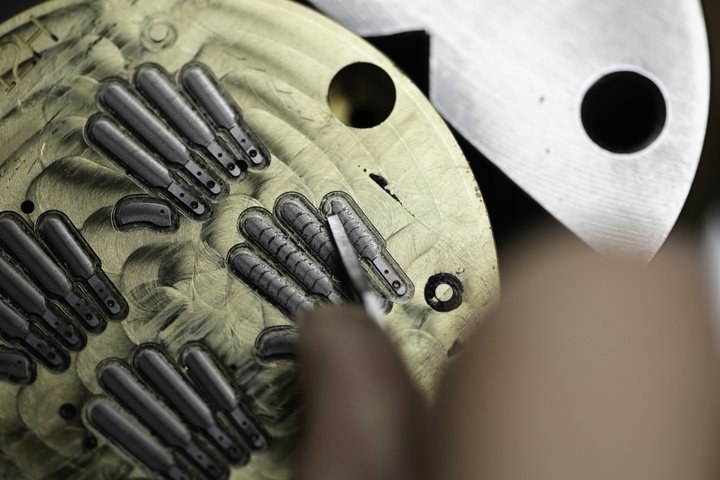 Hand engraving of retractable hands and hour markers for the FP Journe FFC watch.