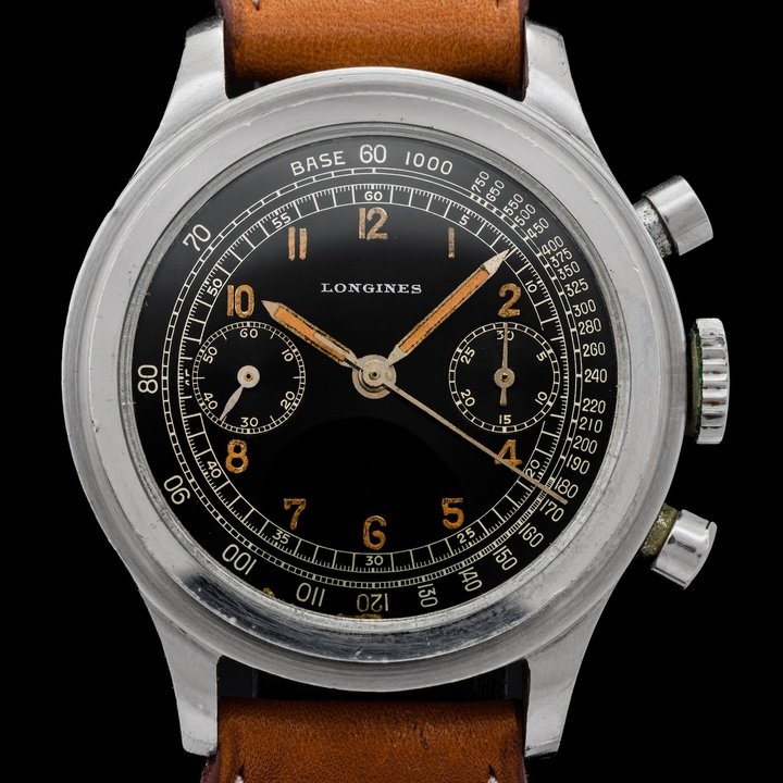 Longines ref. 4974, production date November 1942. Waterproof case and pushers, 13ZN flyback calibre, 18 jewels, column wheel, shock-resistant, Glucydur balance, anti-magnetic. Case: 37.5 mm diameter, stainless steel, screw-down caseback.