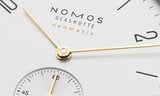 Nomos Orion neomatik doré and Tangente neomatik doré